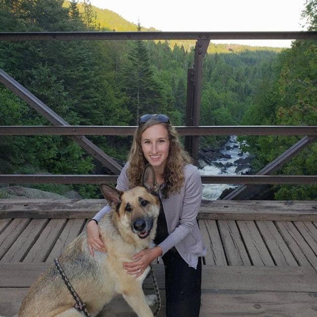 Girl and dog on bridge in Lutsen, MN