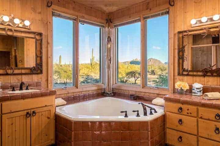Scottdale Cozy cabin bathroom with view of cacti out the window