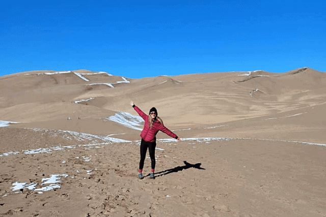 Girl at Great Sand Dunes National Park during Texas to Colorado Road Trip 