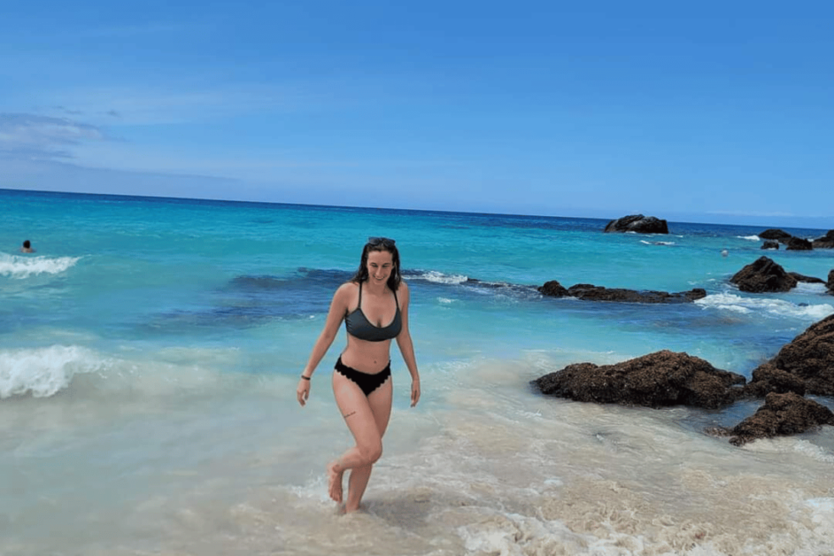 girl on beach on the big island of hawaii