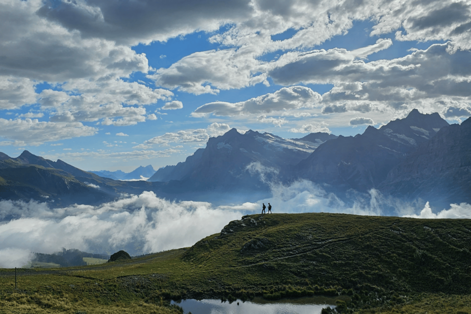 two people on the panorama trail in the jungfrau region of switzerland 