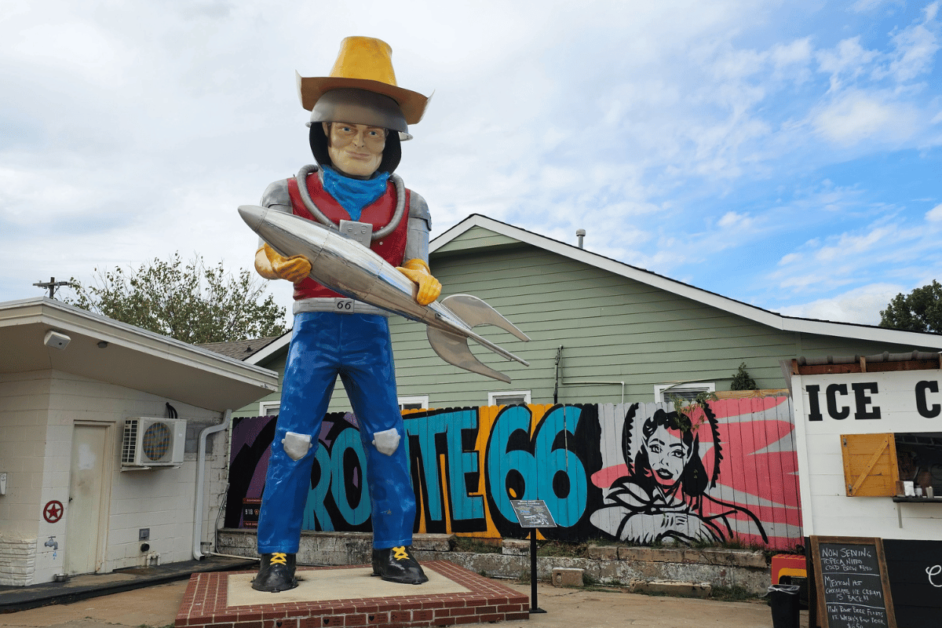 unique stops on route 66 by state- Buck Atoms statue and gift shop in Oklahoma 