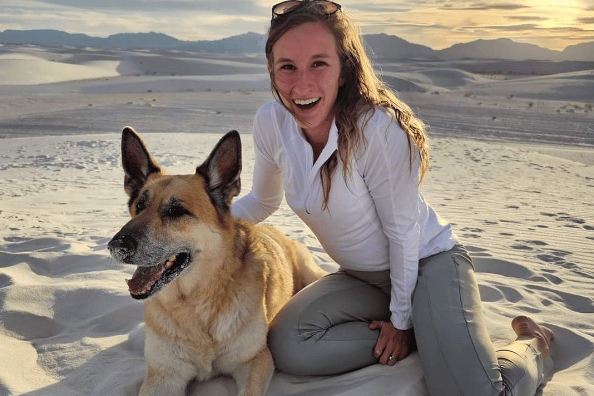 Girl and dog at dog-friendly National Park White Sands.