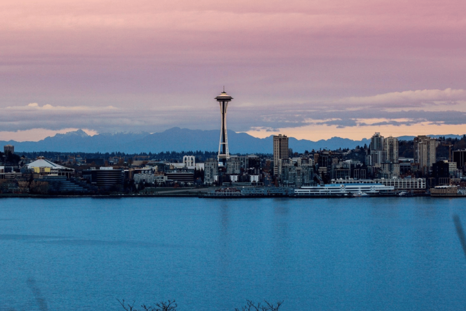 A picture of the Space Needle in Seattle at sunrise from Queen Anne Hill in Kerry Park. 