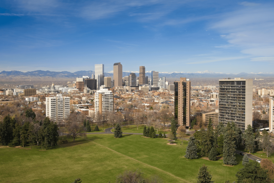 Aerial shot of Cheeseman Park with the Denver skyline