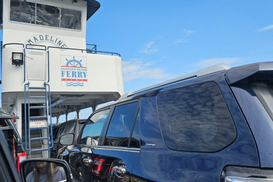 cars on ferry to madeline island. 