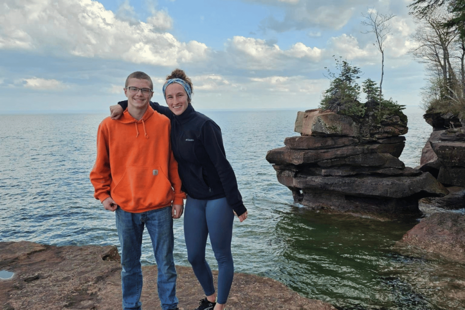 Two people hiking the Bay View Trail in Madeline Island. 