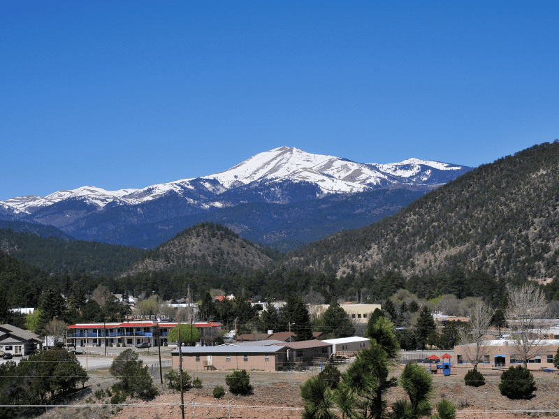 ruidoso with a snowy mountain. 