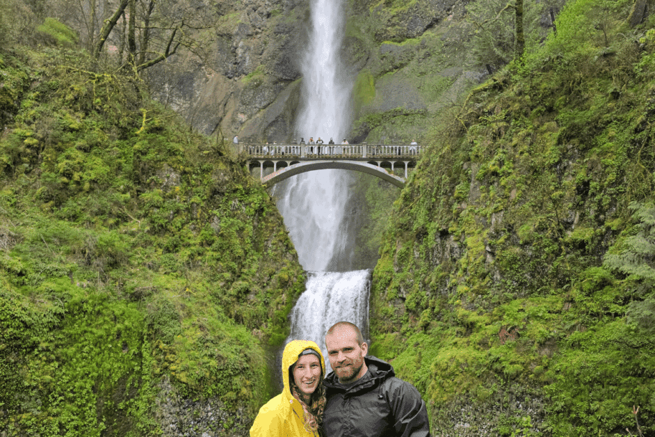 2 people in front of the Multnomah Falls. 