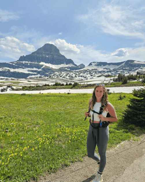 girl at logans pass along the going to the sun road in glacier national park.